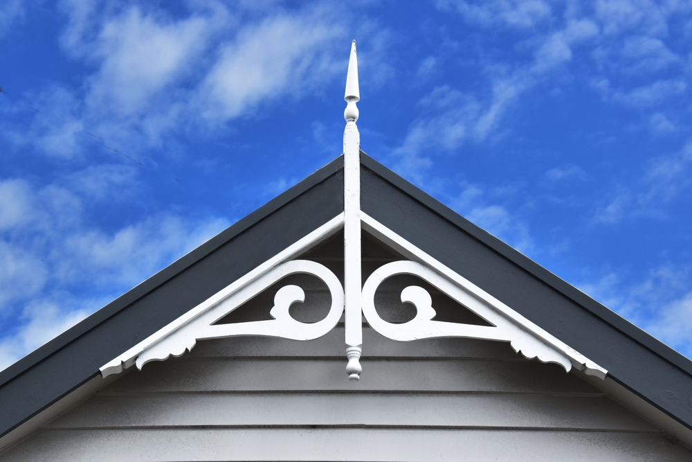 A finial at the top of a roof edge.