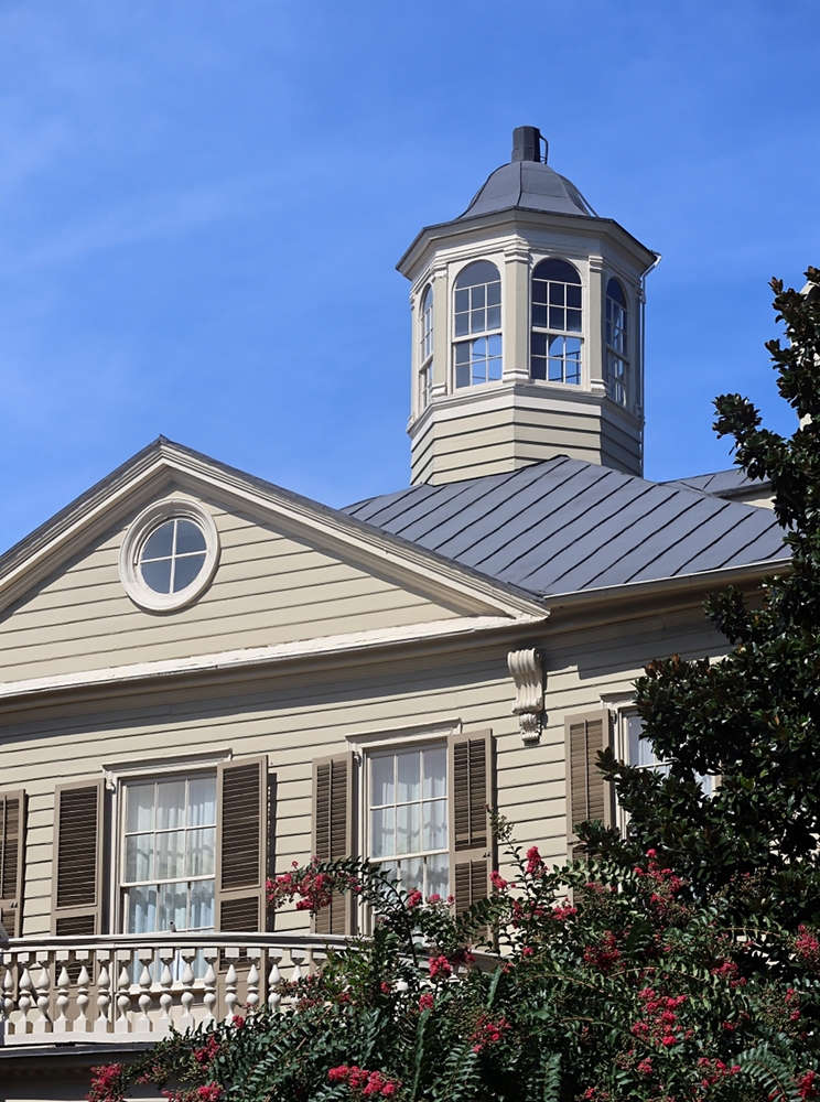 A cupola on top of a house.