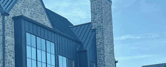 Chimney cap on stone chimney